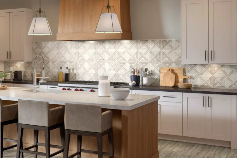 A Kitchen with white cabinets and a beautiful backsplash as featured image