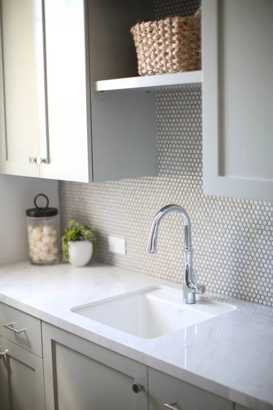 Penny Tiles with White Cabinets