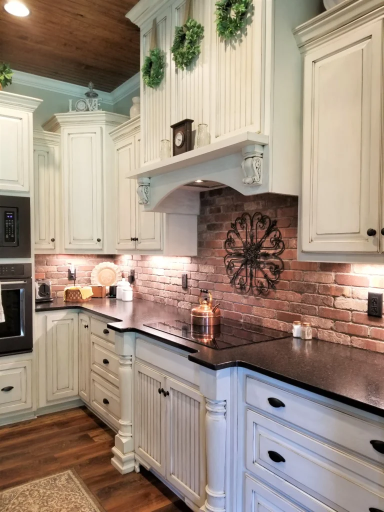 White Cabinets with Rustic Bick Backsplash