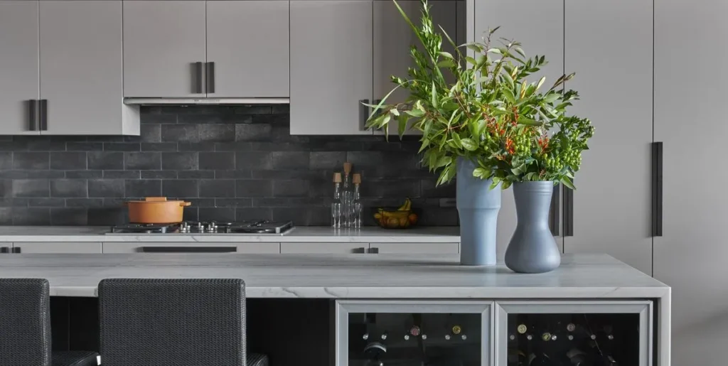 White Cabinets with Black Backsplash