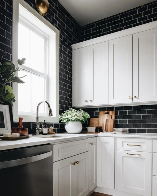 Black Backsplash with White Cabinets