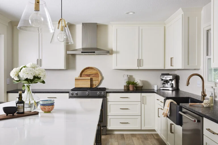 A beautiful Kitchen With White cabinets