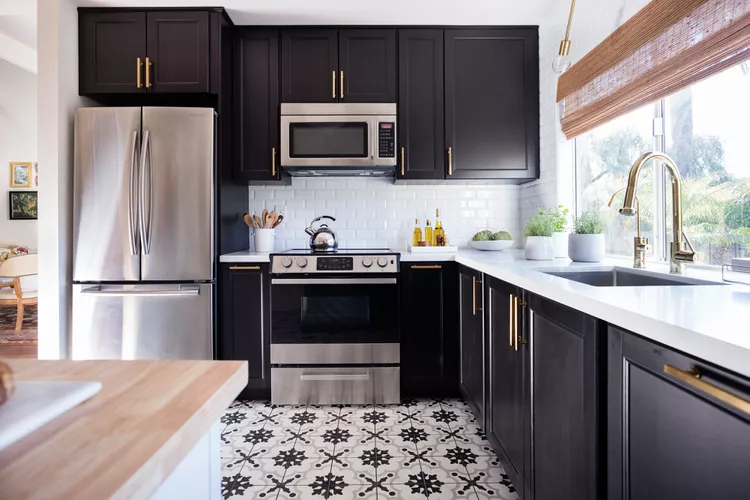 Black and Stainless steel cabinets combination in a beautiful kitchen 