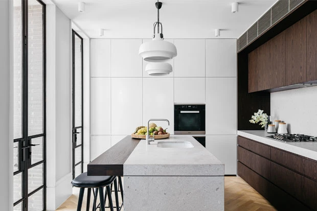 A modern Kitchen with Choco Wood Plus White Cabinets