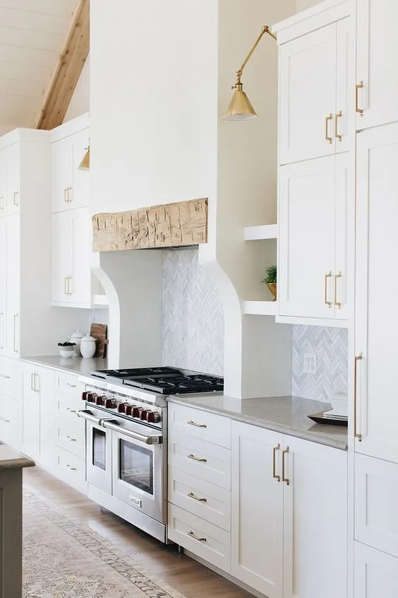 A beautiful kitchen with kitchen cabinets having Benjamin Moore OC 117 