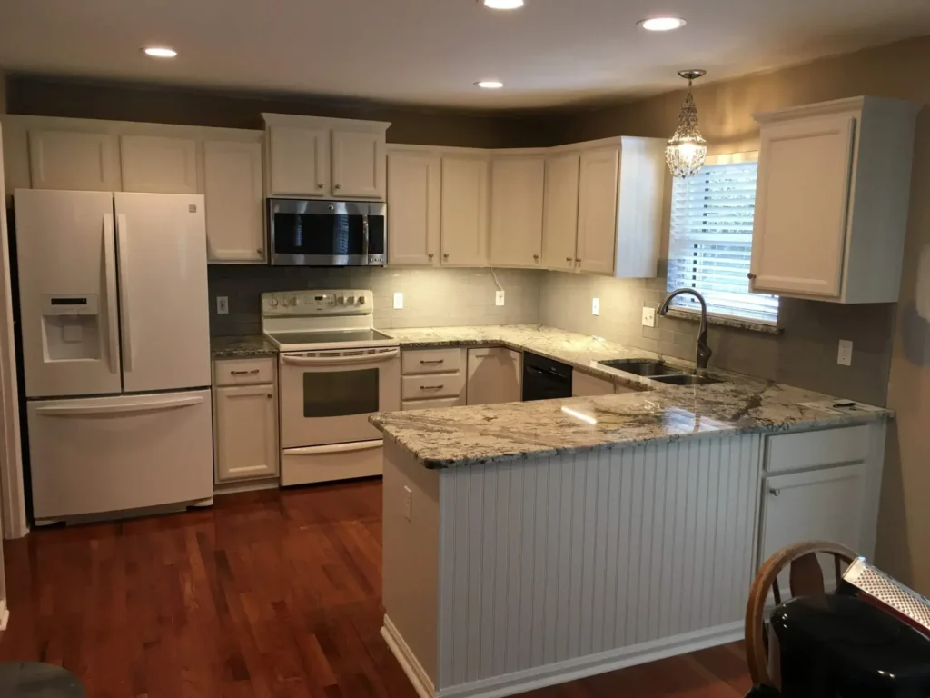 A beautiful kitchen with cabinets having Sherwin Williams White Duck