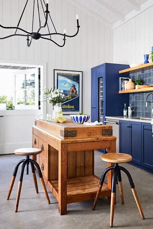 Butcher Block Island with stools in a beautiful Kitchen