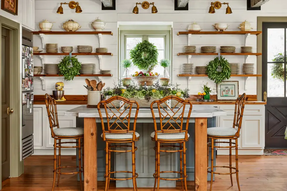 Dark Gray Green Kitchen Cabinets in a beautiful kitchen with horizontal wood plank walls and the stained wood butcher block worktops and shelves