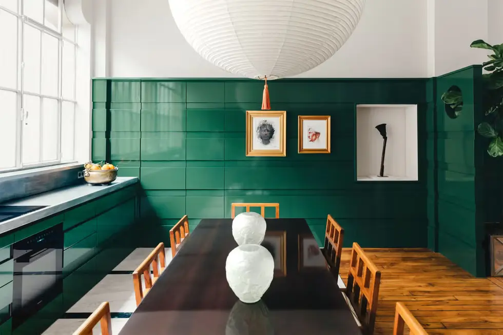 Glossy Green Kitchen Cabinets and White shiplap walls and light timber floors