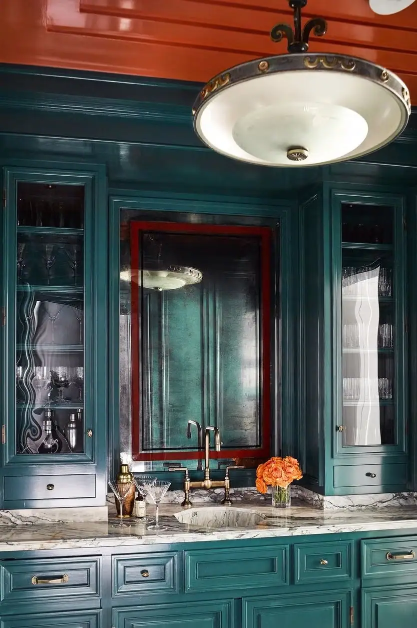 Kitchen with Mallard Green Kitchen Cabinets and a marble countertop in Indigo Green