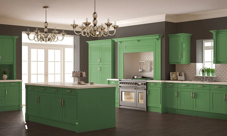 A beautiful kitchen with Mint Green Cabinets and kitchen island has a white countertop