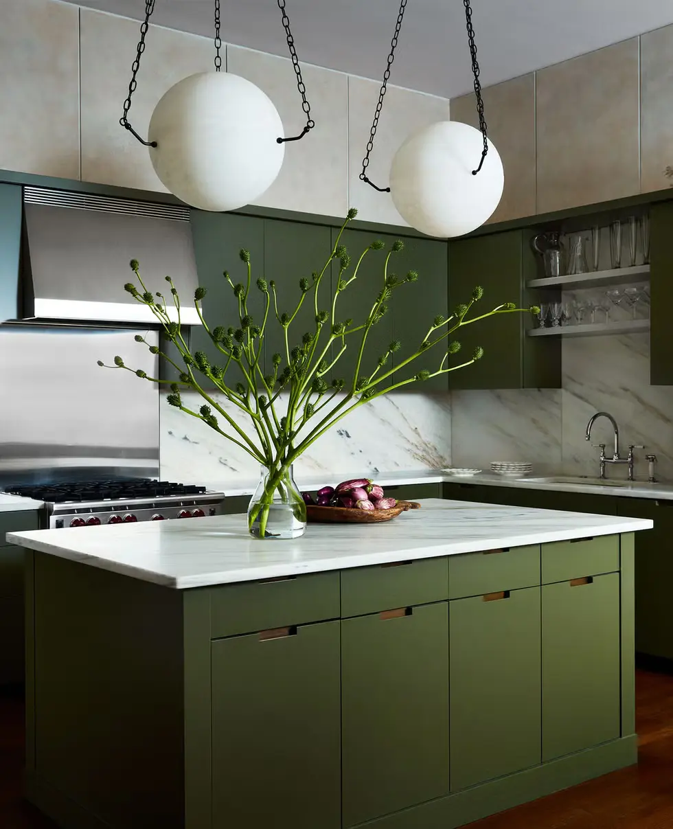 A modern kitchen with Cabinets painted in Behr's Russian Olive making Olive green Cabinets