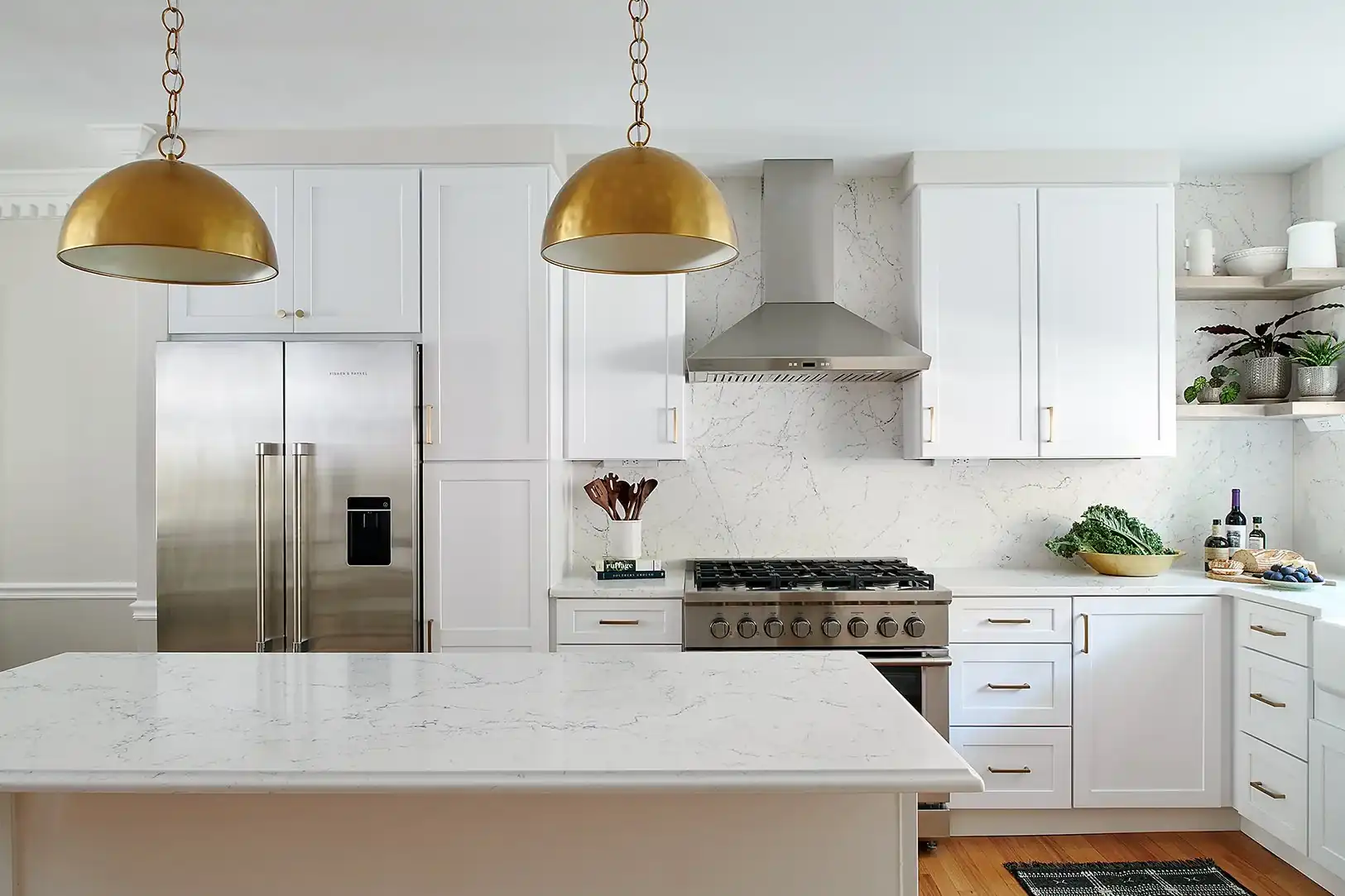 A modern kitchen with solid surface countertop and solid surface backsplash