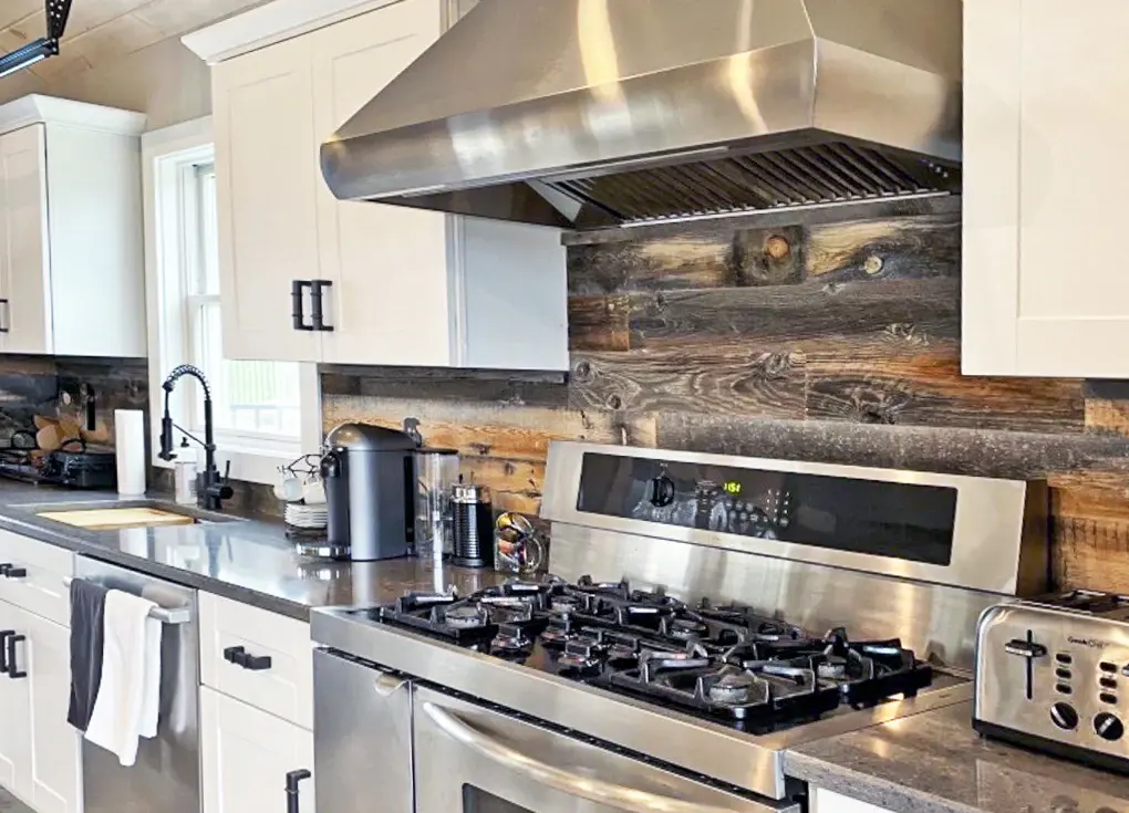 A modern kitchen with Reclaimed Wood Backsplash 