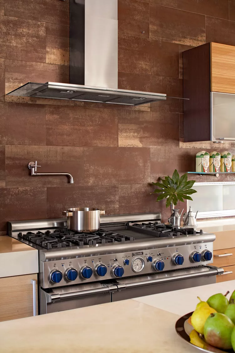 Rustic Kitchen Backsplash with chocolate-brown porcelain tiles stretching from the countertop to the ceiling 