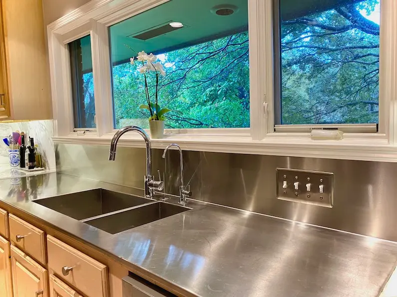 Stainless Steel Countertops with steel backsplash