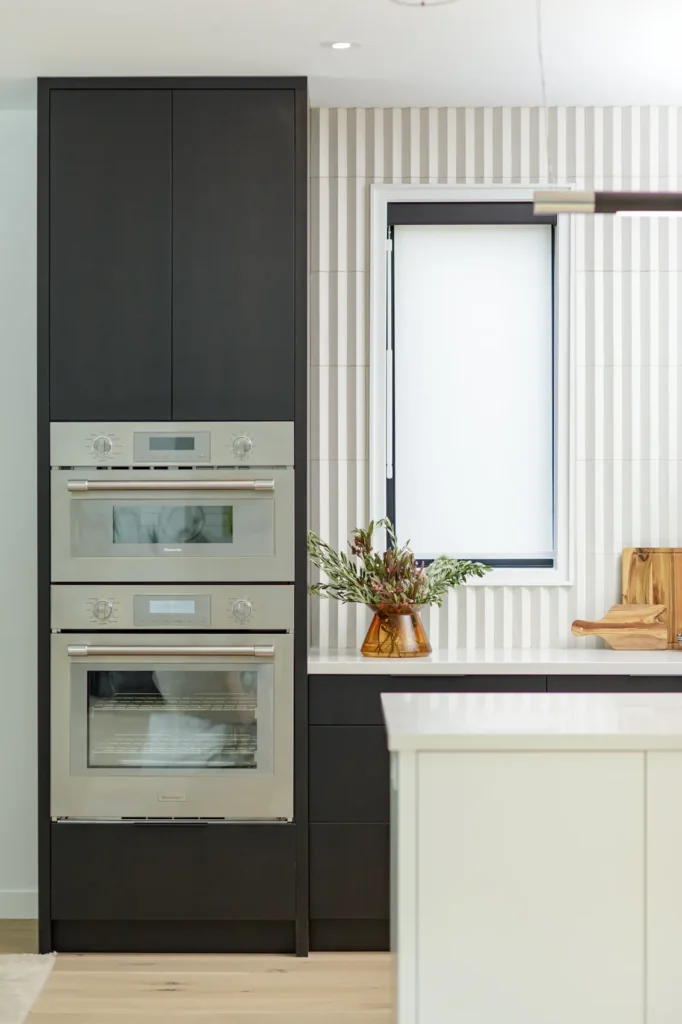 Black Cabinetry in Flat Panel with Wallpaper 