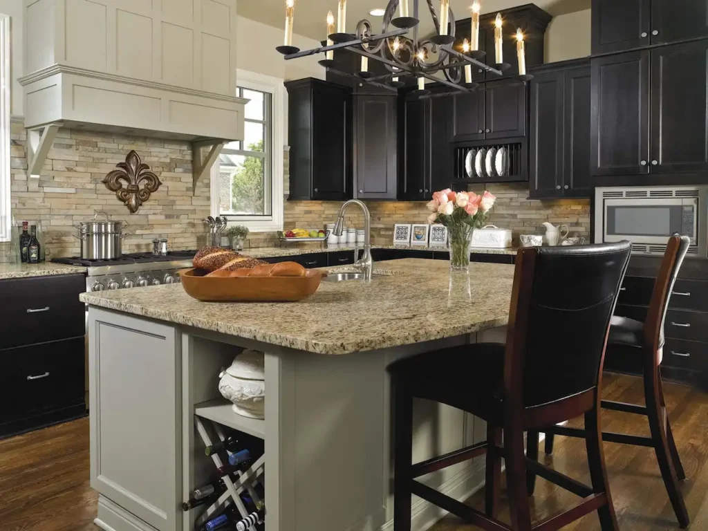 a beautiful kitchen with Black Cabinets With Colored stone Countertop 